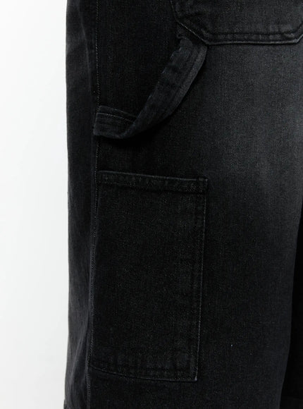 Men's Relaxed Denim Carpenter Shorts IL513 Black close-up detail of side cargo pocket and hammer loop stitching on washed black denim fabric