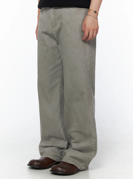 Men's Relaxed Fit Pants (Light Gray) IU523 Light Gray side shot on model highlighting wide-leg profile and back pocket detail with brown boots