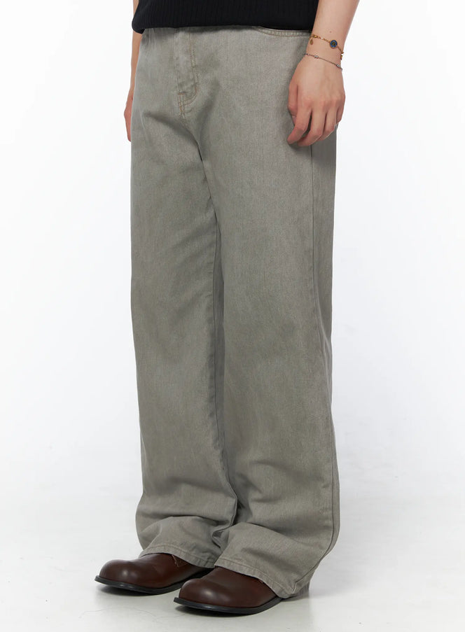 Men's Relaxed Fit Pants (Light Gray) IU523 Light Gray side shot on model highlighting wide-leg profile and back pocket detail with brown boots