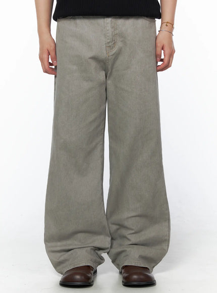 Men's Relaxed Fit Pants (Light Gray) IU523 Light Gray front crop shot on model showing wide-leg denim silhouette with brown leather boots