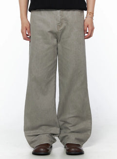 Men's Relaxed Fit Pants (Light Gray) IU523 Light Gray front crop shot on model showing wide-leg denim silhouette with brown leather boots