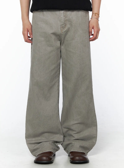 Men's Relaxed Fit Pants (Light Gray) IU523 Light Gray front crop shot on model showing wide-leg denim silhouette with brown leather boots