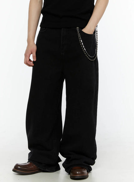 LEWKIN Men's Relaxed Fit Wide Leg Jeans IL509 Black front close-up on model with silver double chain detail at side pocket, styled with black tee and brown loafers