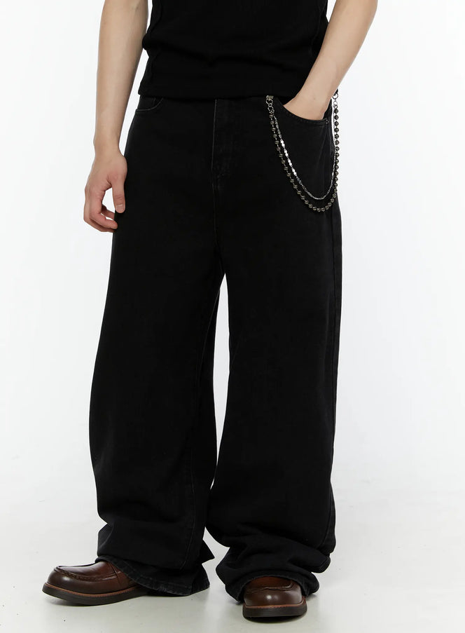 LEWKIN Men's Relaxed Fit Wide Leg Jeans IL509 Black front close-up on model with silver double chain detail at side pocket, styled with black tee and brown loafers