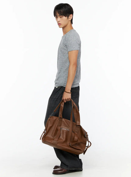 Men's Ribbed Slim-Fit T-Shirt IL520 Gray side profile full-body shot on male model carrying large brown leather bag looking downward with wide-leg black denim
