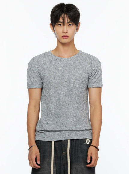 Men's Ribbed Slim-Fit T-Shirt IL520 Gray close-up front shot on male model highlighting ribbed knit texture crew neckline and slim fit body paired with dark pants
