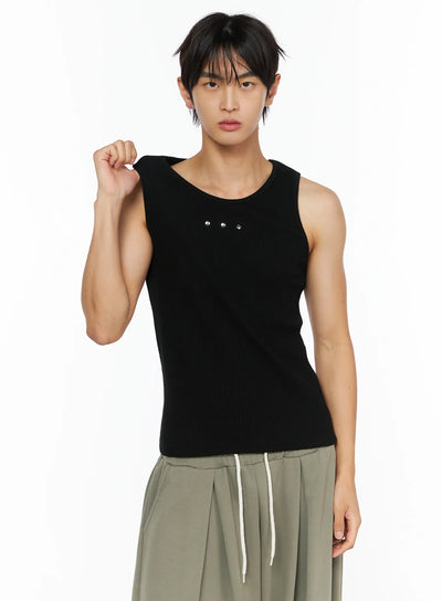 LEWKIN Men's Ribbed Studded Tank Top IL528 Black front shot on male model wearing fist-raised pose styled with olive drawstring wide-leg trousers