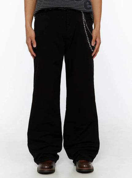 LEWKIN Men's Semi-Flared Black Pants IL509 Black front view on model wearing striped tee with silver chain accessory and wide-leg silhouette