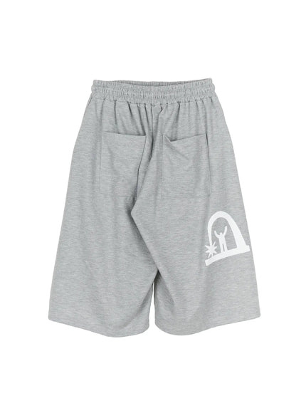 Men's Shooting Star Printed Shorts (Gray) IL509 Gray flat-lay back showing two patch pockets, elastic waistband, wide-leg drape, and white arch figure graphic print on lower leg