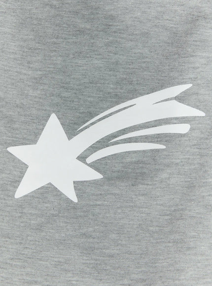 Men's Shooting Star Printed Shorts (Gray) IL509 Gray close-up detail of white shooting star graphic print on heathered gray cotton fabric, showing star and streak tail design