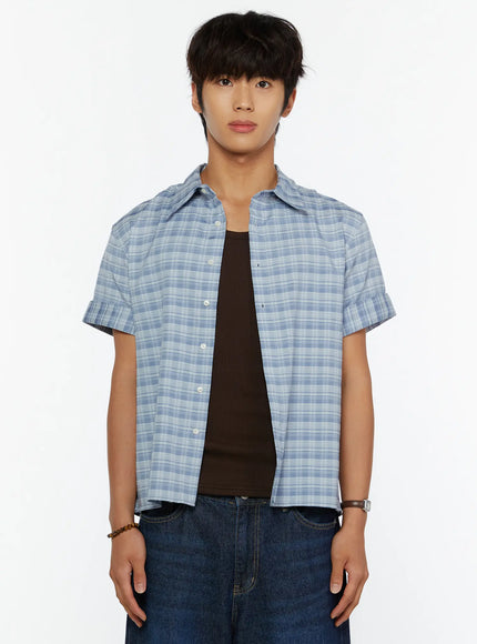 Men's Short Sleeve Plaid Shirt IL515 Blue front close-up shot on model from chest up showing collar, button placket, and plaid fabric texture