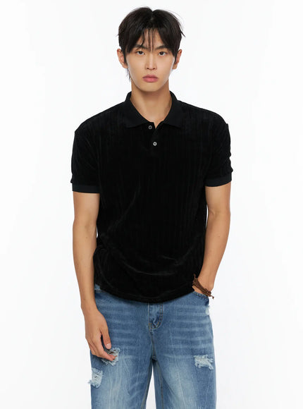 LEWKIN Men's Short Sleeve Velour Polo Shirt IL520 Black front shot on male model paired with distressed blue jeans, velvet texture visible