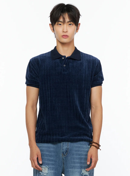Men's Short Sleeve Velour Polo Shirt IL520 Navy close-up front shot on male model highlighting polo collar, button placket, and vertical stripe velour texture