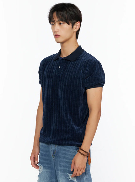 Men's Short Sleeve Velour Polo Shirt IL520 Navy side shot on male model showing vertical stripe velour texture and polo collar detail