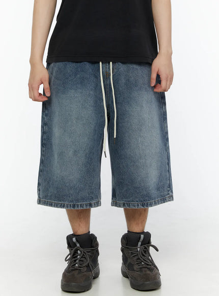Men's Star Bolt Graphic Print Jorts (Blue) IL507 Blue close-up front view on model highlighting cream drawstring elastic waistband and washed denim texture