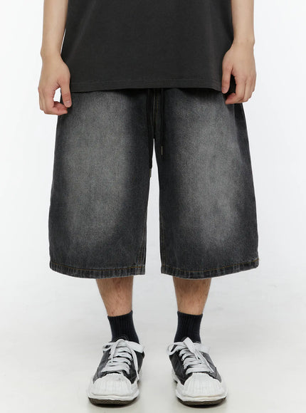 LEWKIN Men's Star Bolt Graphic Print Jorts (Dark Gray) IL507 front view on model wearing black tee and sneakers, wide-leg washed denim shorts