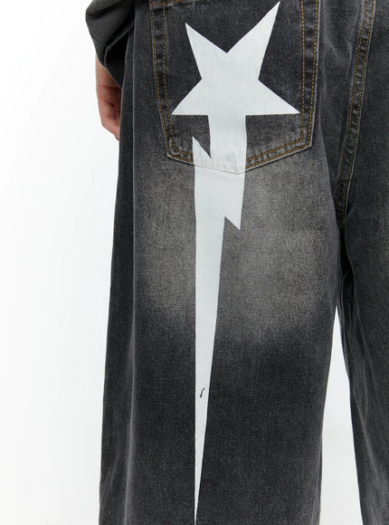 Men's Star Bolt Graphic Print Jorts (Dark Gray) IL507 close-up detail of white star lightning bolt graphic print and back pocket with gold topstitching