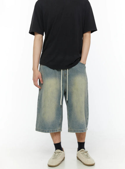 Men's Star Bolt Graphic Print Jorts (Light Blue) IL507 front view on model styled with black tee and cream sneakers showing drawstring waist