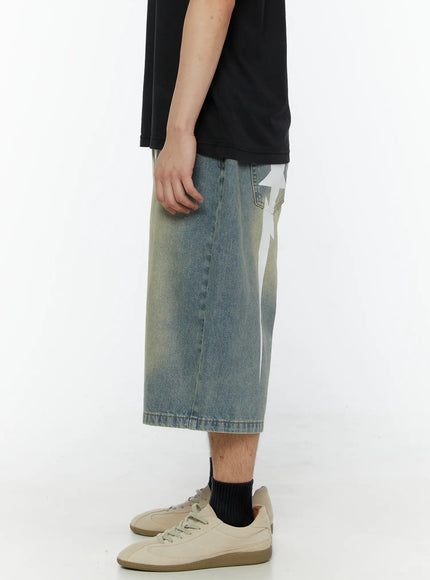 Men's Star Bolt Graphic Print Jorts (Light Blue) IL507 side view on model showing white star and lightning bolt graphic on right leg with vintage wash