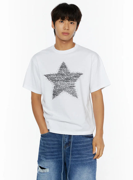 Men's Star Graphic T-Shirt IL509 White front crop shot on male model hand in pocket showing large black typography star graphic print on chest with ripped jeans