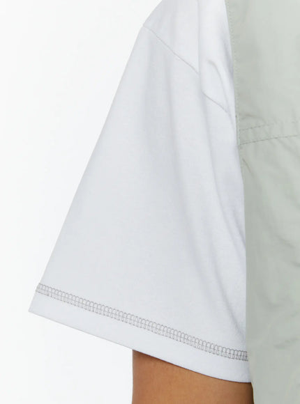 Men's Stitched Cropped T-Shirt IL513 White close-up detail of sleeve hem showing contrast overlock stitching and smooth cotton fabric texture