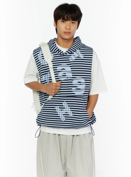 LEWKIN Men's Striped Graphic Hoodie IL510 Light blue front shot on male model size M/L with backpack, layered over white tee and grey trousers