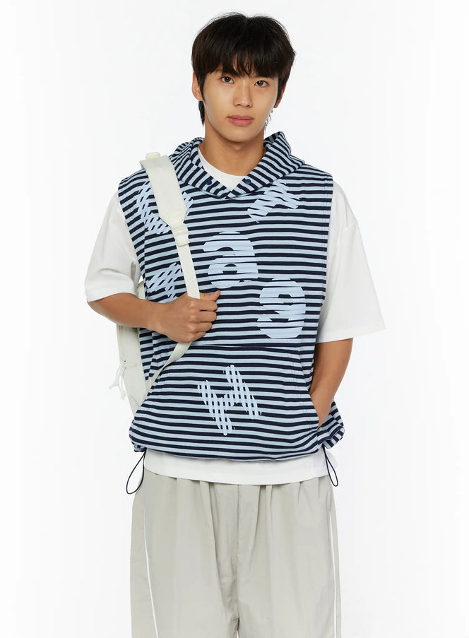 LEWKIN Men's Striped Graphic Hoodie IL510 Light blue front shot on male model size M/L with backpack, layered over white tee and grey trousers