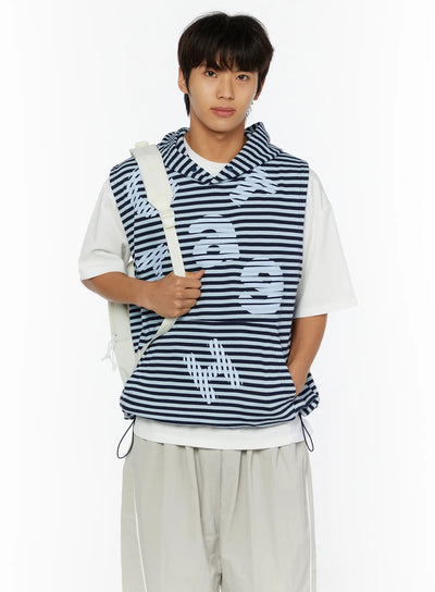 LEWKIN Men's Striped Graphic Hoodie IL510 Light blue front shot on male model size M/L with backpack, layered over white tee and grey trousers