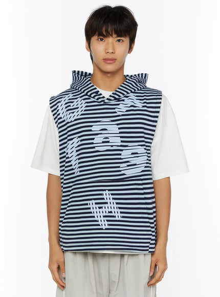 Men's Striped Graphic Hoodie IL510 Light blue front shot on male model standing straight, full-length view of light blue graphic print on navy stripe sleeveless hoodie