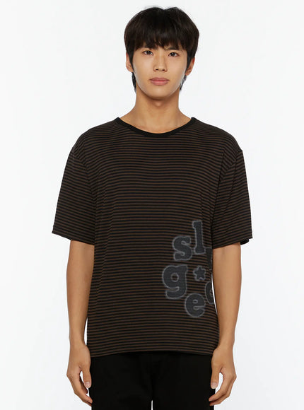 Men's Striped Graphic T-Shirt IL509 Dark brown cropped front shot on male model facing forward showing side-placed bubble letter graphic on striped tee