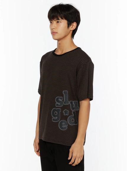 Men's Striped Graphic T-Shirt IL509 Dark brown side shot on male model turned right showing full slogan graphic print on striped cotton fabric