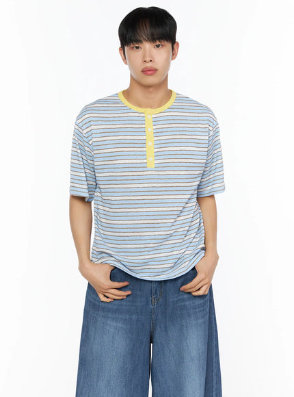Men's Striped Henley Tee IL514 Blue cropped front shot on male model showing yellow contrast henley placket and stripe texture