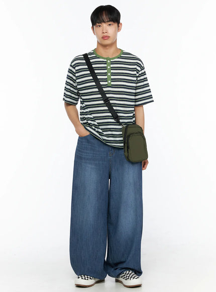 Men's Striped Henley Tee IL514 Green full-body front shot on male model with olive crossbody bag hand in pocket casual street styling