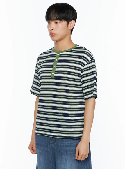Men's Striped Henley Tee IL514 Green side shot on male model showing three-quarter angle green contrast collar and button placket detail