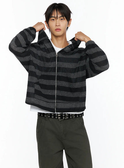 Men's Striped Knit Zip-Up Hoodie IL528 Black S/M front close-up model shot both hands gripping hood lapels charcoal black stripe open-knit texture silver zipper detail