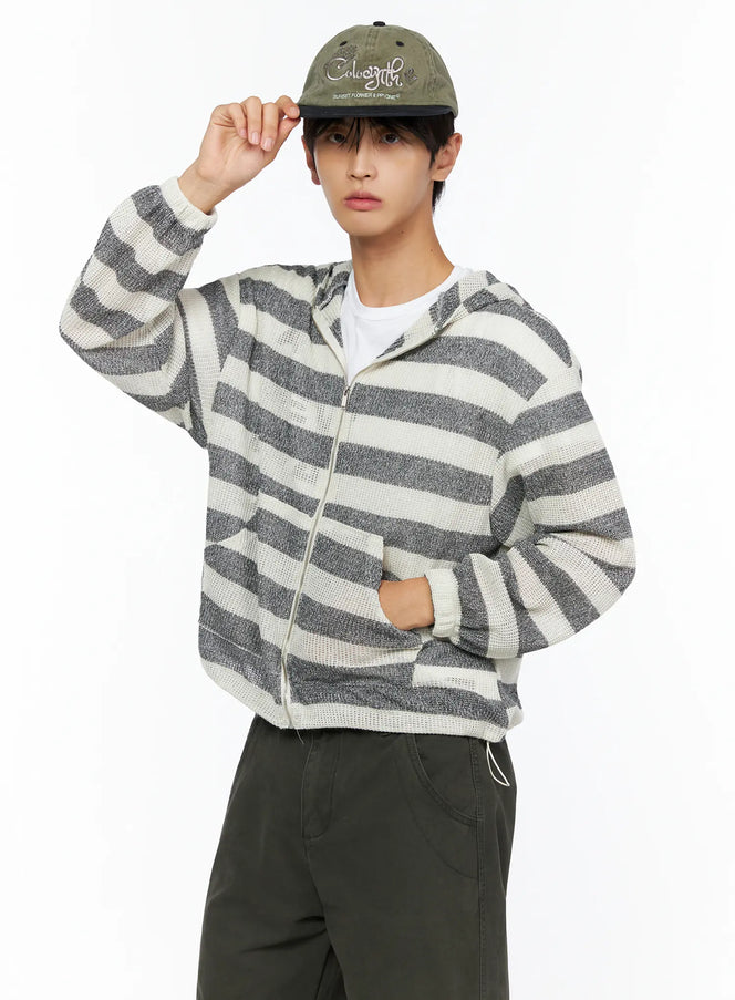 Men's Striped Knit Zip-Up Hoodie IL528 Gray White three-quarter front model shot cap pose one hand on brim open-knit stripe zip-up layered over white tee