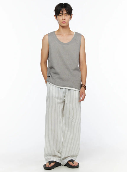 Men's Striped Lounge Pants IL520 Light green full-body front shot on male model styled with gray knit tank top and black sandals, relaxed wide-leg fit