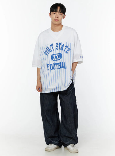 LEWKIN Men's Striped Oversized T-Shirt IU529 White front full-body model shot styled with dark wide-leg jeans and white sneakers, blue VOLT STATE FOOTBALL graphic on mesh fabric