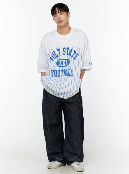 Men's Striped Oversized T-Shirt IU529 White front full-body model with hands in pockets, oversized mesh football jersey silhouette styled with wide-leg dark denim
