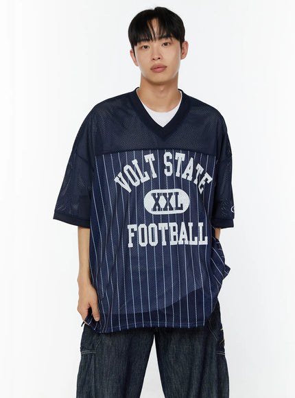 Men's Striped Oversized T-Shirt IU529 Navy front cropped model shot showing white VOLT STATE XXL FOOTBALL graphic on pinstripe lower panel with V-neck mesh upper