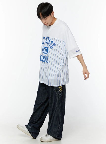 Men's Striped Oversized T-Shirt IU529 White side-walk model pose looking down, showing mesh fabric texture and blue pinstripe lower body panel with side slit hem