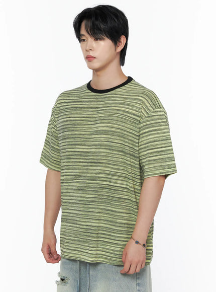 Men's Striped Short Sleeve Tee IL502 Green side shot on male model showing dropped shoulder fit and horizontal stripe texture with black contrast crewneck rib