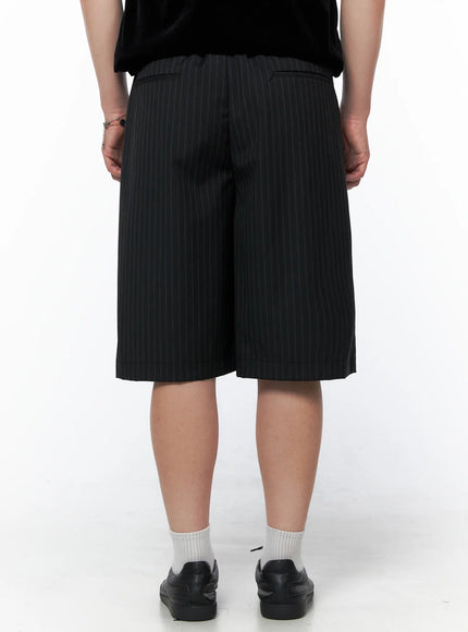 Men's Striped Shorts & Belt Set (Black) IL502 Black back model shot showing rear pocket detail wide-leg pinstripe shorts hem and back waistband with white socks