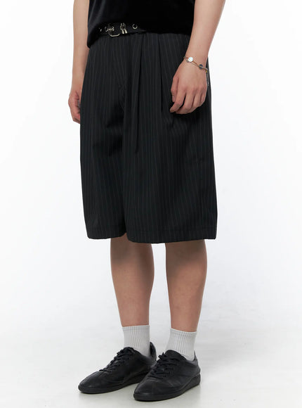 LEWKIN Men's Striped Shorts & Belt Set (Black) IL502 Black angled front model shot size M/L wide-leg pinstripe shorts with eyelet belt and black sneakers