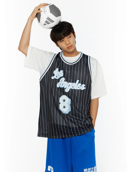 Men's Striped Sleeveless Jersey IL509 Black front shot on male model raising soccer ball overhead, white pinstripe mesh fabric with Los Angeles script and number 8
