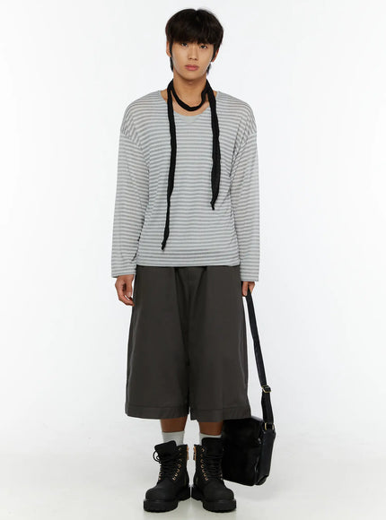 LEWKIN Men's Striped V-Neck Long Sleeve Tee IL515 Gray S/M front shot on model standing upright styled with black scarf wide shorts and combat boots