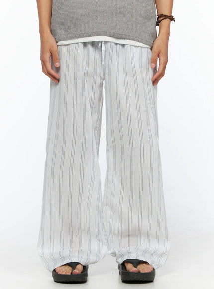 LEWKIN Men's Striped Wide-Leg Pants IL520 Light blue front view on model wearing gray knit top and sandals, wide-leg silhouette with drawstring elastic waist