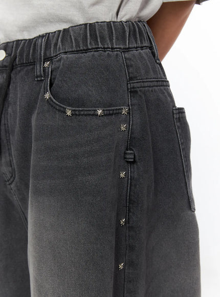 Men's Studded Jorts IL520 Black close-up detail of back pocket area showing silver star studs along seam and elastic waistband