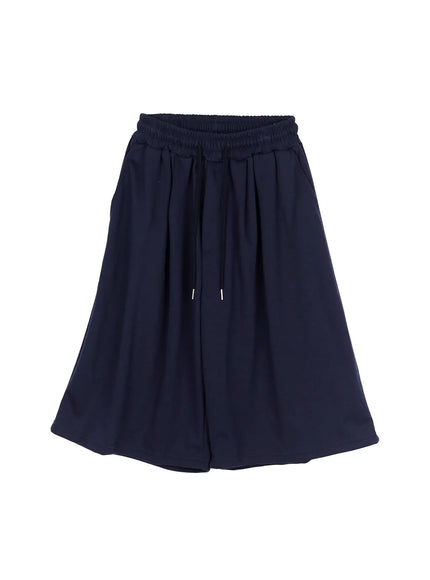 Men's Swirl Print Back Pocket Shorts (Dark Blue) IL509 Dark Blue flat-lay front view showing elastic drawstring waistband pleated wide-leg shorts on white background