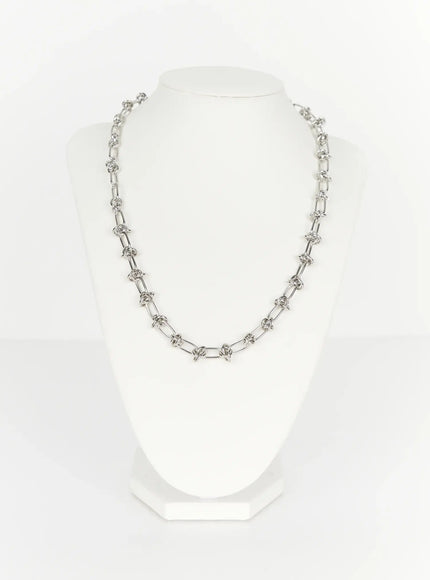 Men's Twisted Chain Necklace IL510 Silver front view on white bust display showing full length of alternating oval and knotted chain links